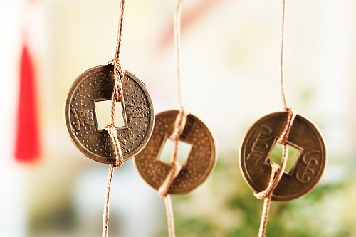 Feng shui coins on light background
